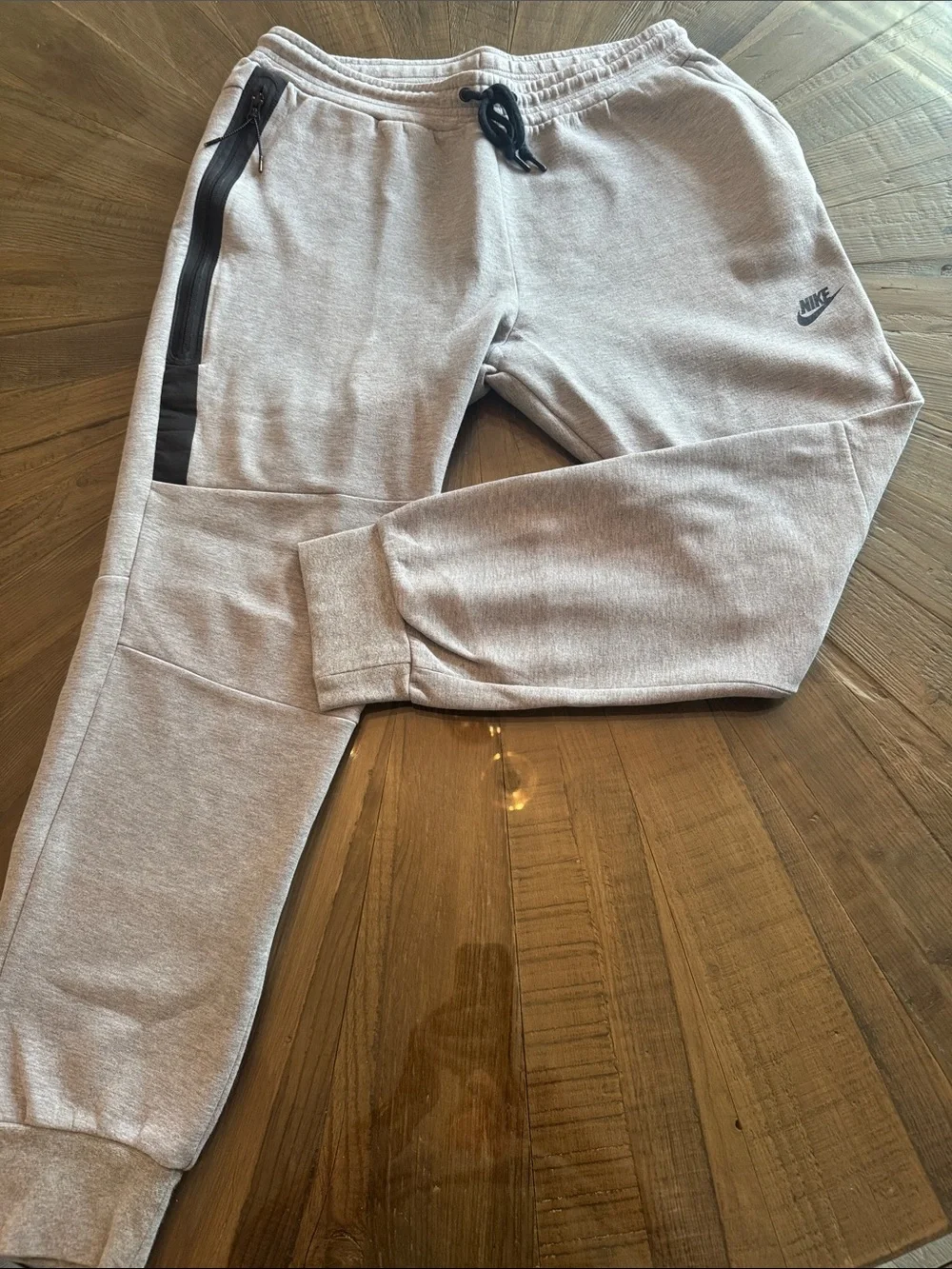 Nike Men’s Light Grey Fleece Tech Joggers with Black Zip Detail